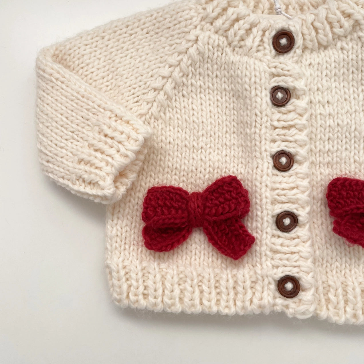 RED BOW CARDIGAN