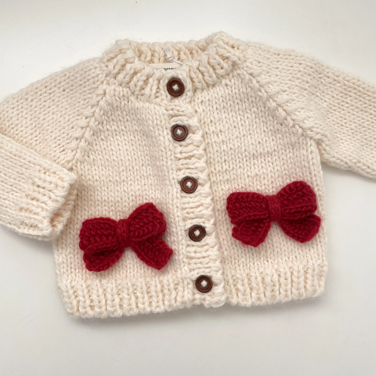 RED BOW CARDIGAN