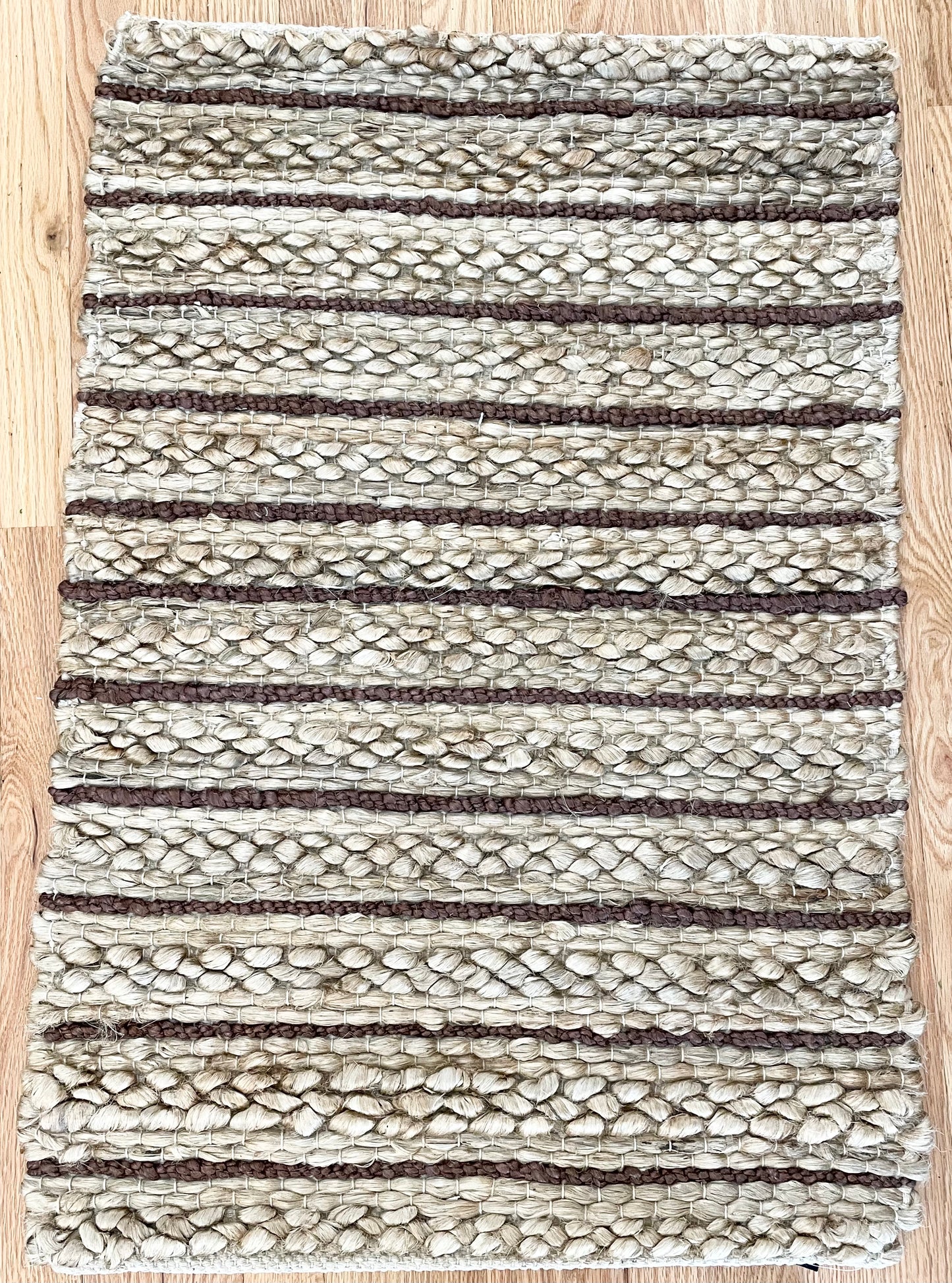 TAN AND BROWN CHUNKY BRAIDED STRIPED JUTE HANDWOVEN RUG